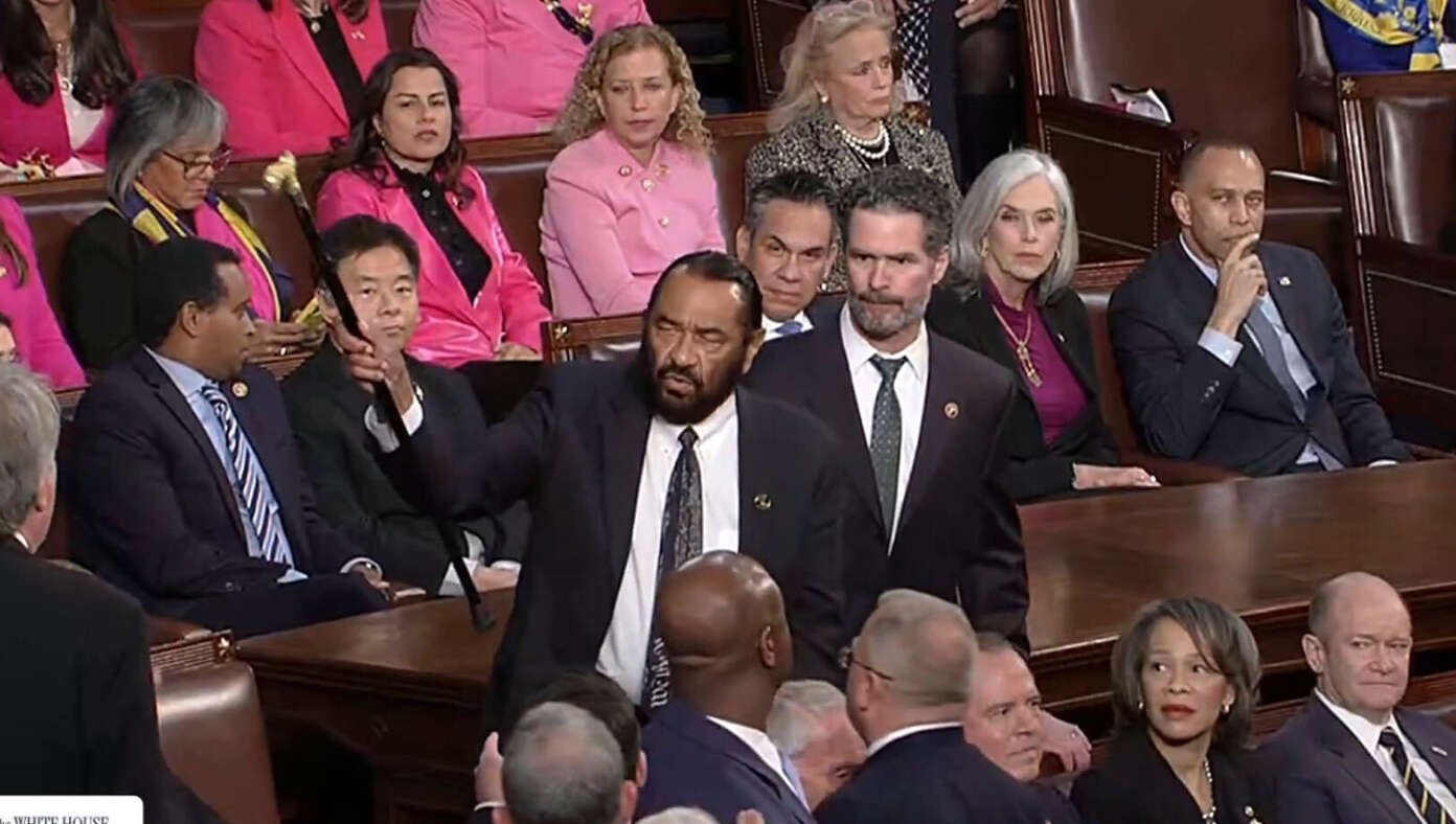 Sergeant At Arms Gently Escorts Lib To The Cry Room