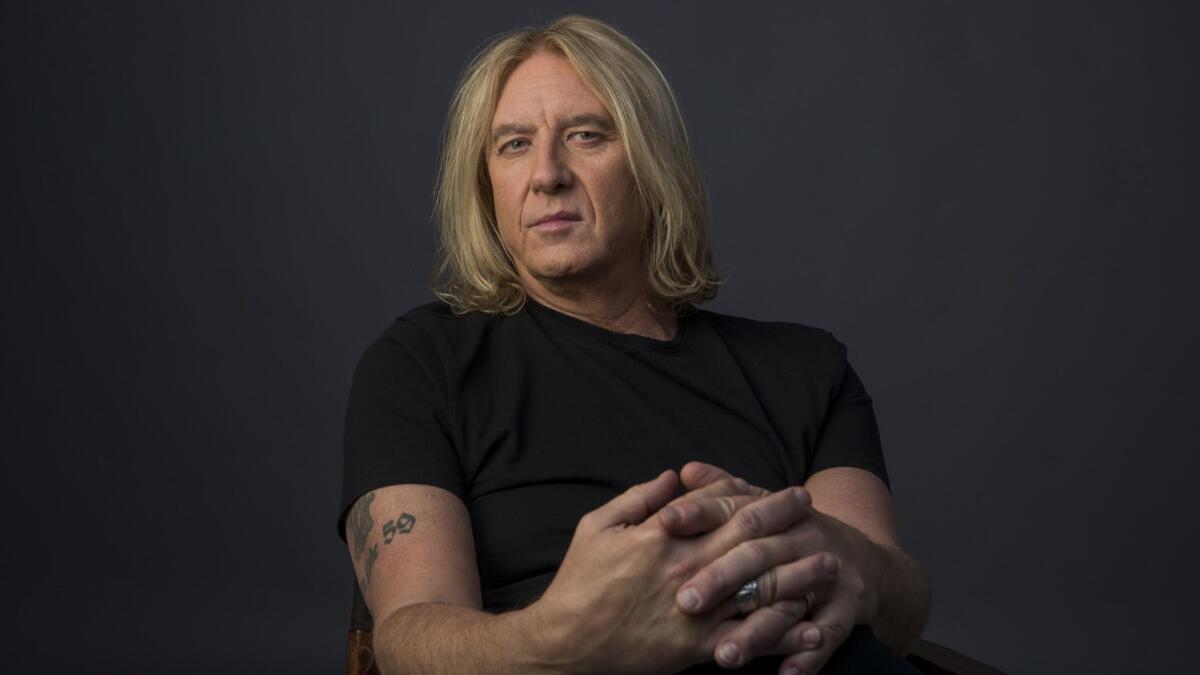 Joe Elliott Gushes Over Geezer Ozzy: “He’s, Like, A Rock God Or Something”