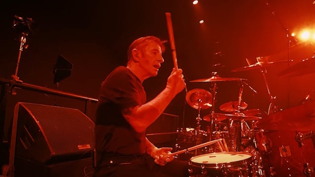 AC/DC’s PHIL RUDD Finally Joins March 2026 ‘Full Metal Orchestra’ Because Apparently They Couldn’t Book A Drum Machine