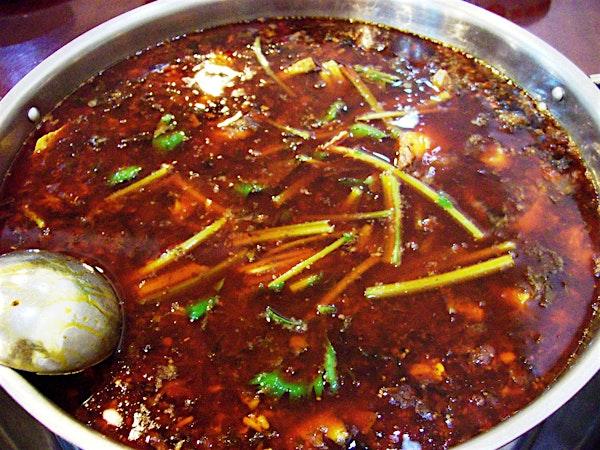 The camera crew gets roasted harder than the Sichuan peppers at Behind The Camera House’s hot pot party