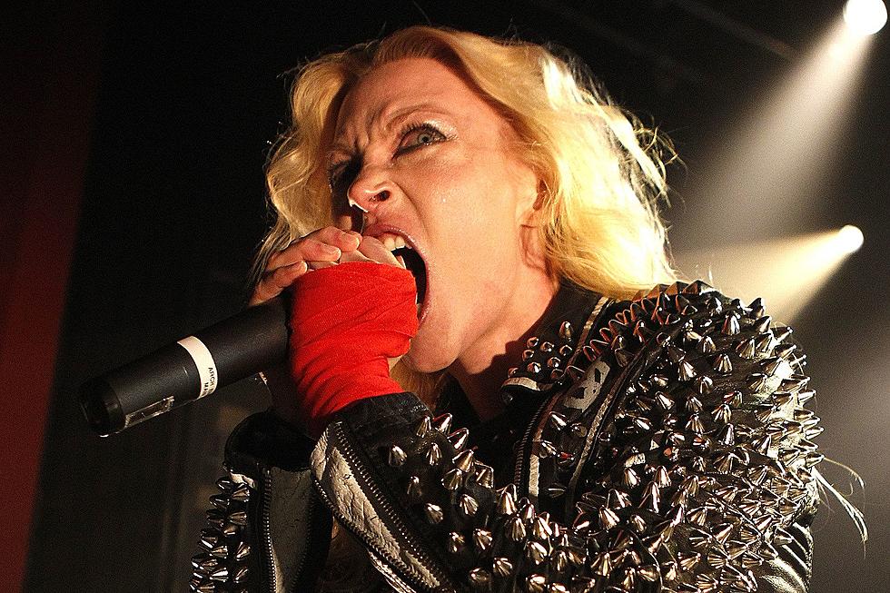 ANGELA GOSSOW DECLARES “NOT ME!” TO ARCH ENEMY REUNION RUMORS, LEAVING FANS AS CONFUSED AS A VEGAN AT A BBQ