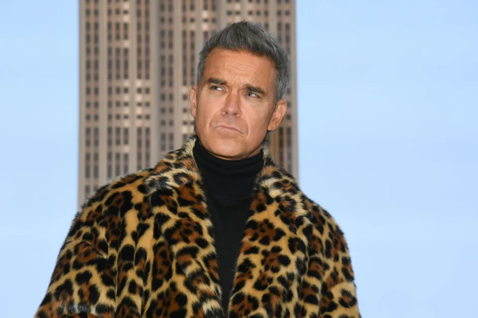 Robbie Williams Emerges from Retirement Again Apparently